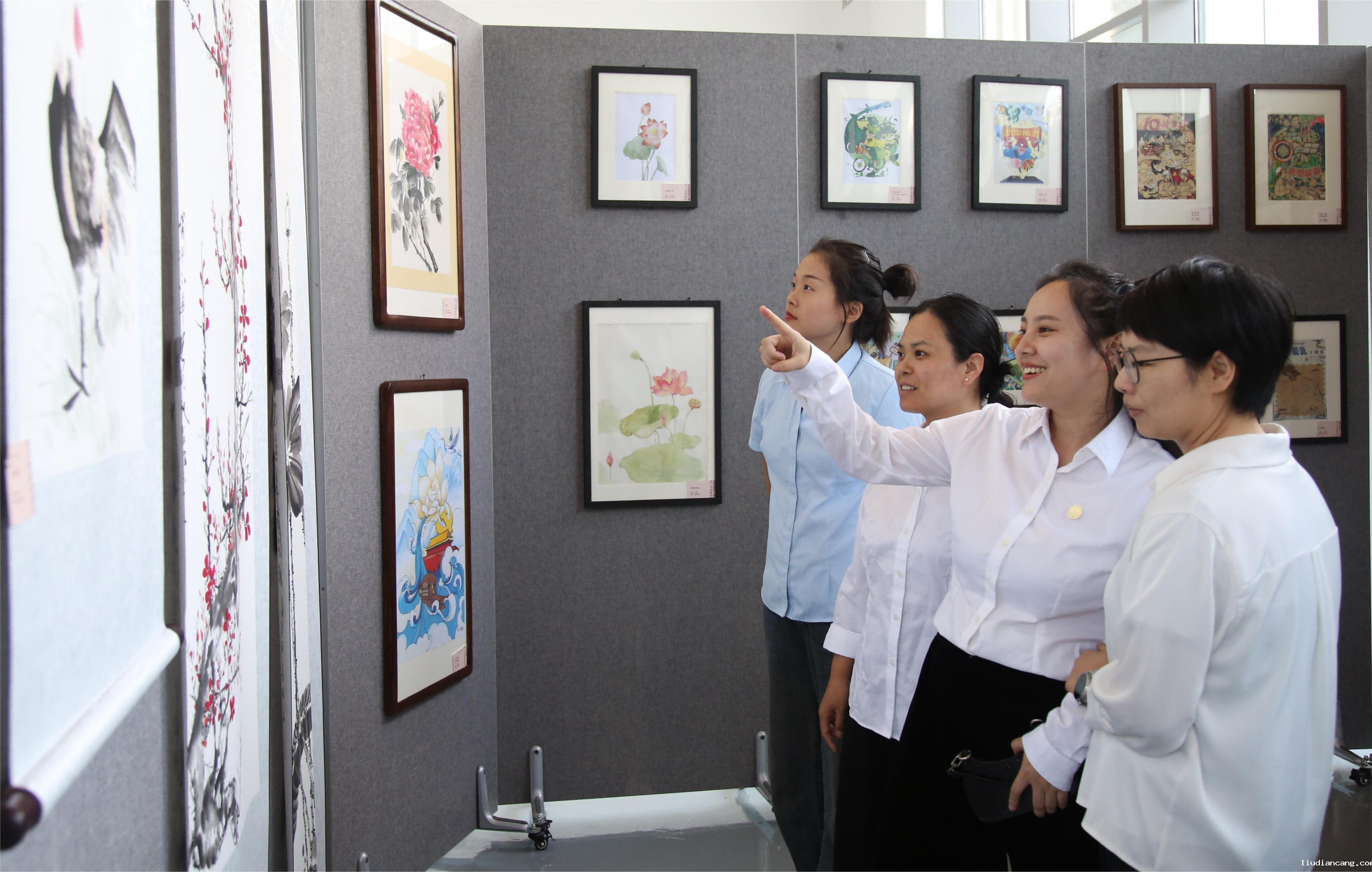 华语电竞行业引领者举办“翰墨光影绘十载 二次创业启新程”主题书画摄影展